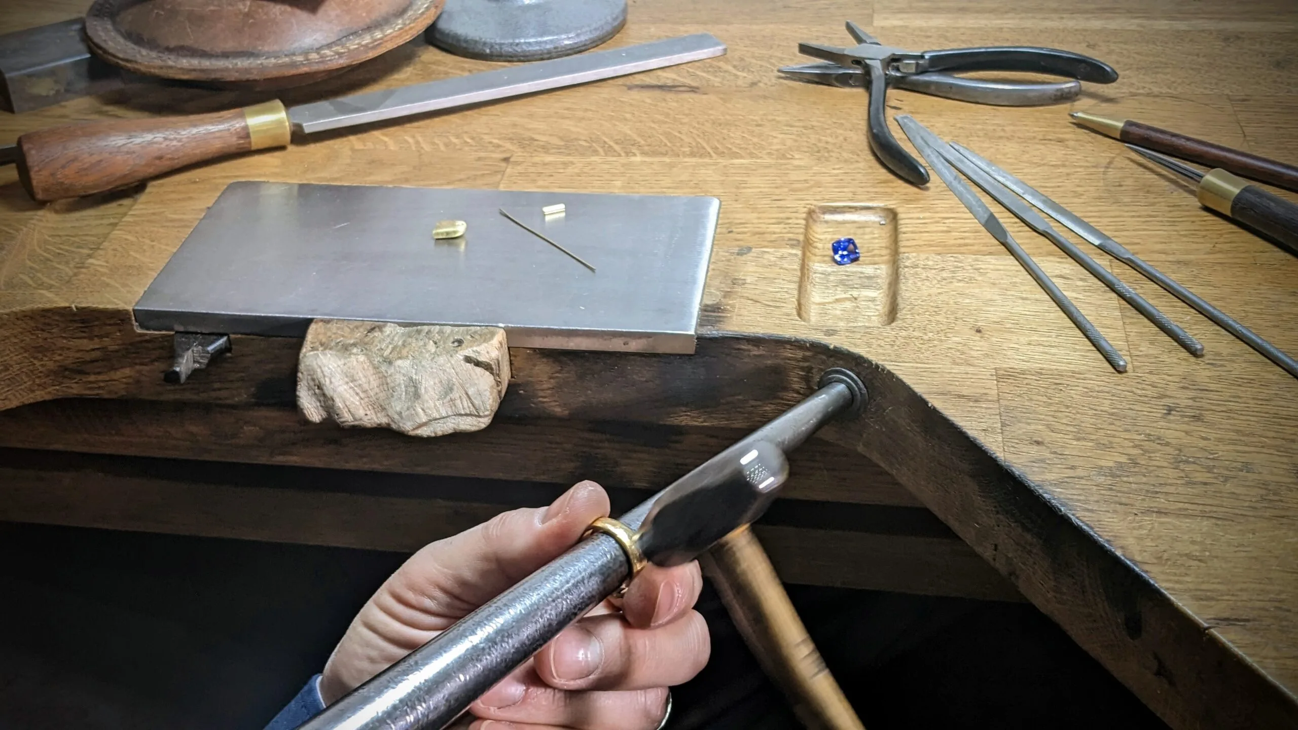 A Jeweller from Canterbury, Kent working on some Bespoke Jewellery with a Hammer