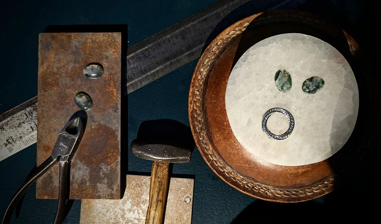 Diamond and Platinum Ring with Rustic Jewellery Workshop Tools and Moss Agate Gemstones