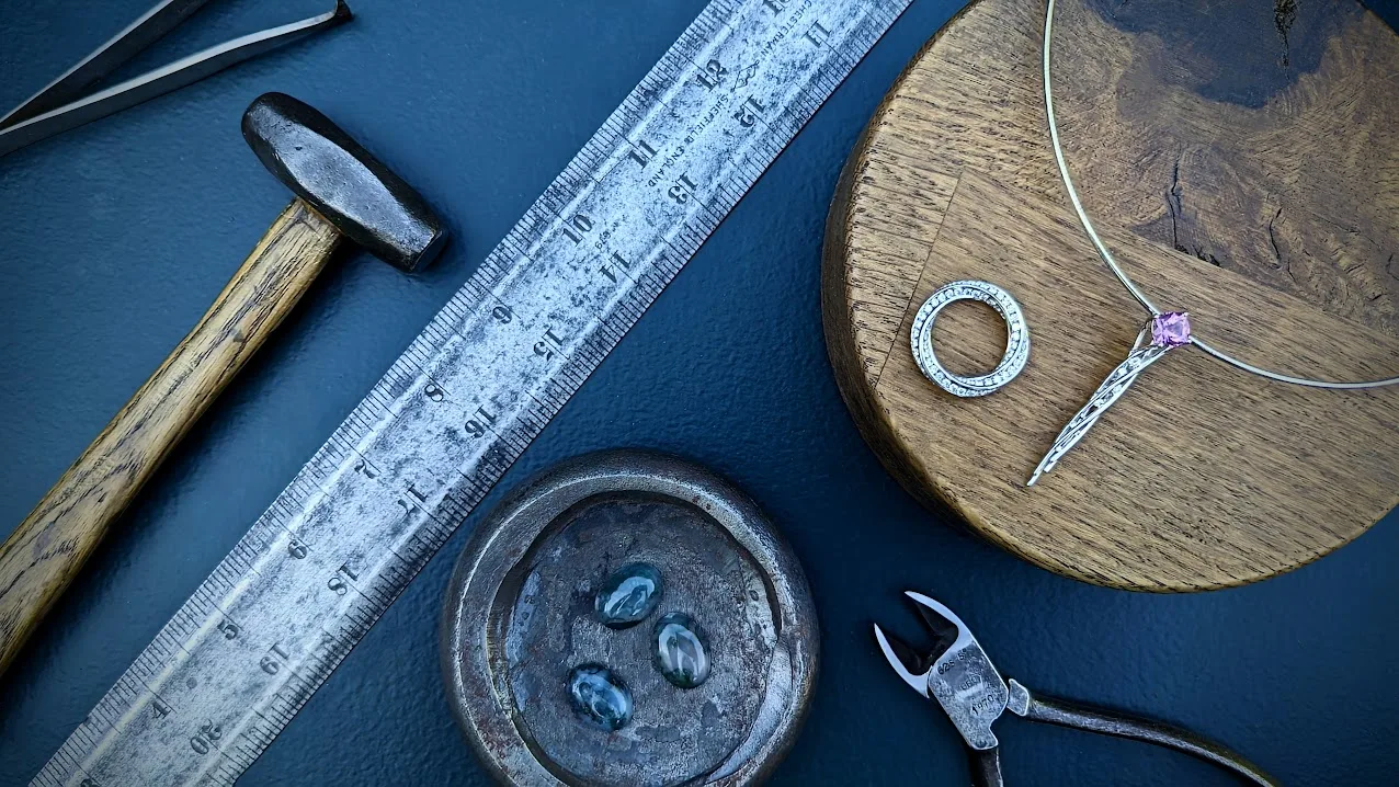 Diamond and Platinum Ring and Necklace with Rustic Jewellery Workshop Tools and Moss Agate Gemstones
