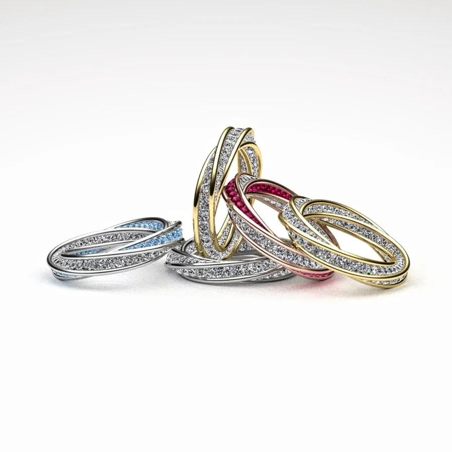 Variations of Gemstones and Precious Metals in a set of 'Twist' Ring Products Bespoke Design by Canterbury, Kent Jeweller