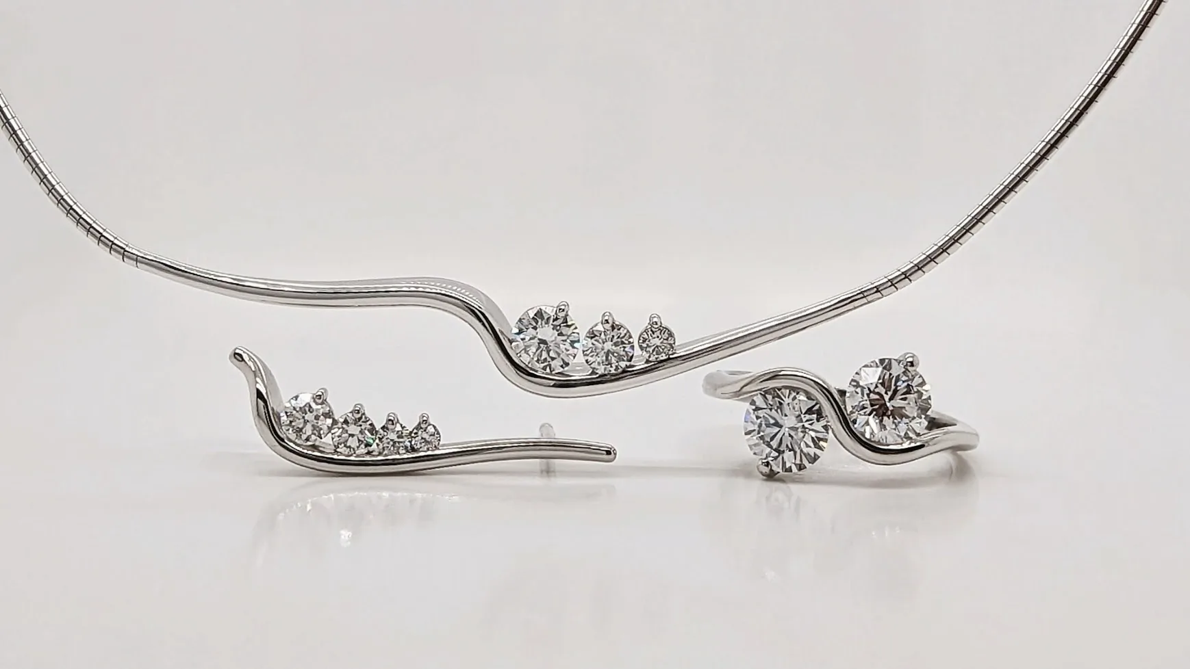 Platinum and Diamond Necklace Pendant, Earrings, and Engagement Ring. Bespoke Design Handmade by Canterbury Kent Jewellers